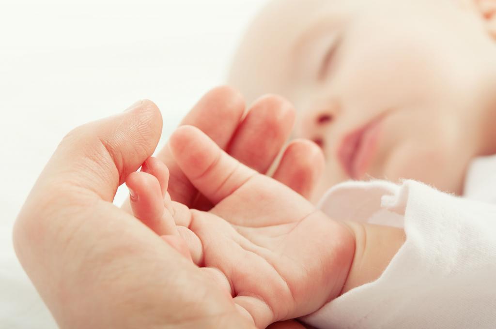 милии у новорожденных на лице